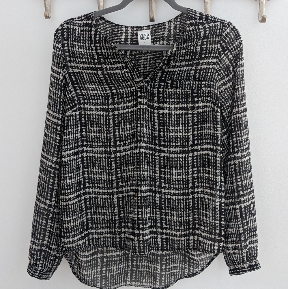 Black and white blouse.